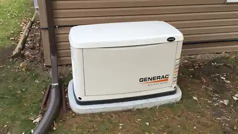 Generac whole-home standby generator on concrete pad beside house