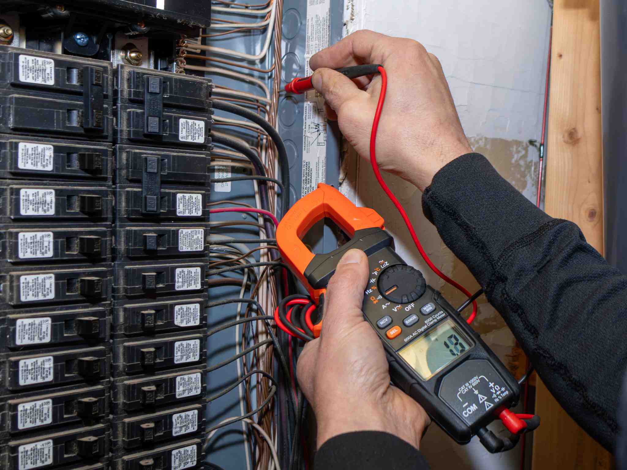Licensed Vancouver electrician troubleshooting residential breaker panel