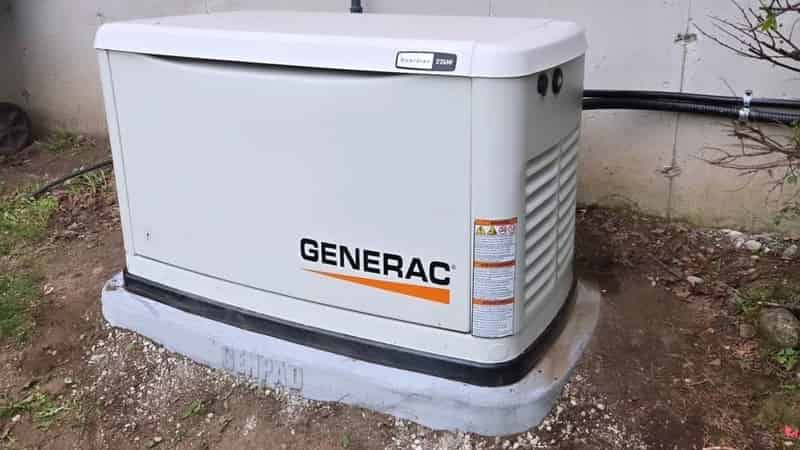 Generac whole-home standby generator on concrete pad